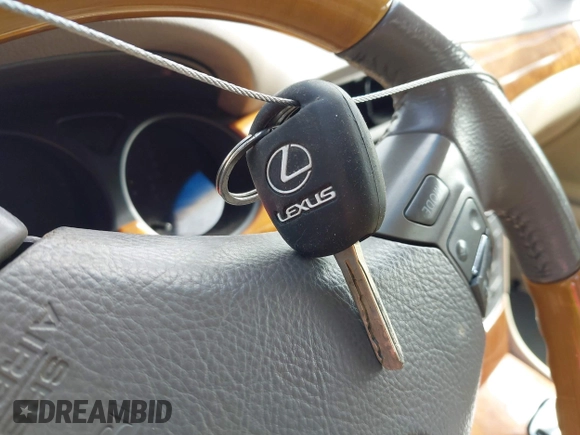 2005 Lexus ES with VIN JTHBA30G655129163, listed as a IAAI auction lot 41523048 with 160,907 mi miles. Bid and sale history available at carsss.com. Image 11.