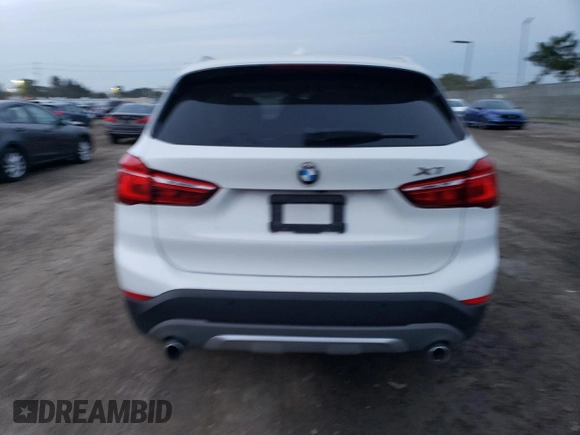 2018 BMW X1 sDrive28i with VIN WBXHU7C35J5H43995, listed as a Copart auction lot 71650602 with 80,437 mi miles. Bid and sale history available at carsss.com. Image 6.