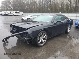 2015 Dodge Challenger SXT Plus with VIN 2C3CDZBG7FH711607, listed as a Copart auction lot 51811545 with 128,272 mi miles and Salvage title. Bid and sale history available at DreamBid. Image 1.