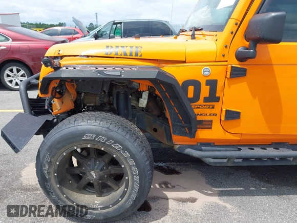 2013 Jeep Wrangler Sport z VIN 1C4AJWAG2DL538526, wystawiony jako IAAI lot #42378501 z przebiegiem 81 709 mil mil oraz . Historia ofert i sprzedaży dostępna na DreamBid. Obrazek 21.