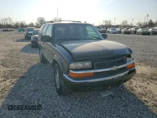 2000 Chevrolet Blazer LT z VIN 1GNDT13W9Y2135306, wystawiony jako Copart lot #47902155 z przebiegiem 152 008 mil mil oraz Szkoda całkowita • Salvage title. Historia ofert i sprzedaży dostępna na DreamBid. Obrazek 12.