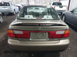 1998 Mazda Protege DX with VIN JM1BC141XW0200689, listed as a IAAI auction lot 41540162 with 172,311 mi miles and . Bid and sale history available at DreamBid. Image 16.