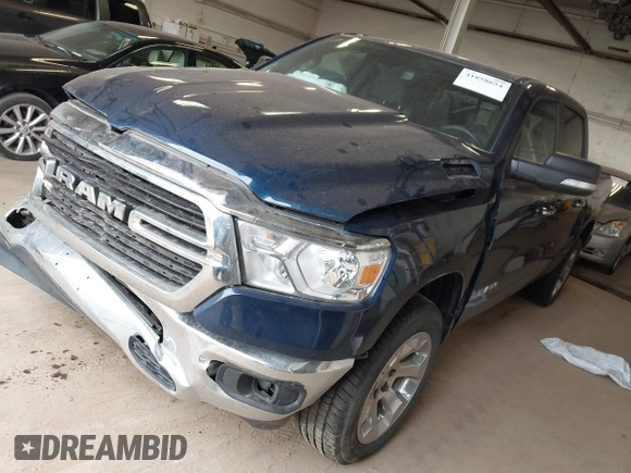 2019 Ram 1500 Big Horn z VIN 1C6SRFFT5KN762580, wystawiony jako IAAI lot #41858654 z przebiegiem 57 801 mil mil oraz . Historia ofert i sprzedaży dostępna na DreamBid. Obrazek 19.