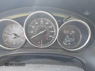 2015 Mazda CX-5 Grand Touring with VIN JM3KE2DY5F0498718, listed as a IAAI auction lot 42070000 with 129,327 mi miles. Bid and sale history available at carsss.com. Image 7.