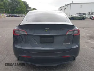 2022 Tesla Model Y Performance z VIN 7SAYGDEF5NF544542, wystawiony jako IAAI lot #42118855 z przebiegiem 27 256 mil mil oraz . Historia ofert i sprzedaży dostępna na DreamBid. Obrazek 16.