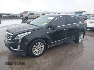 2017 Cadillac XT5 FWD with VIN 1GYKNARS0HZ317508, listed as a IAAI auction lot 40818768 with 132,598 mi miles. Bid and sale history available at carsss.com. Image 2.
