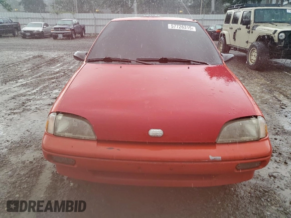 1990 Geo Metro z VIN JG1MR2462LK718930, wystawiony jako Copart lot #57726315 z przebiegiem 72 234 mil mil oraz Tytuł czysty. Historia ofert i sprzedaży dostępna na DreamBid. Obrazek 5.