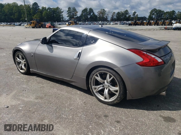 2010 Nissan 370Z Touring with VIN JN1AZ4EH8AM501134, listed as a Copart auction lot 73919614 with 106,599 mi miles and Salvage Title. Bid and sale history available at carsss.com. Image 2.