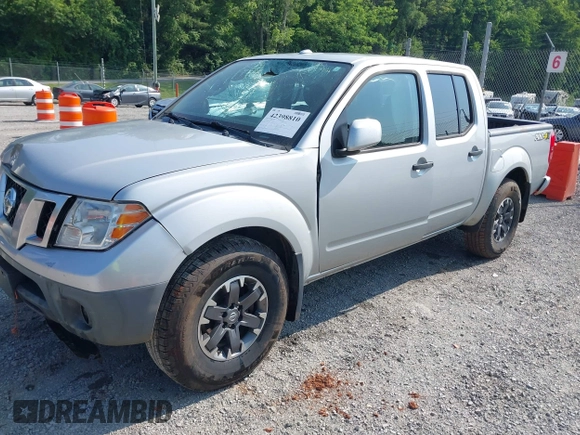 2018 Nissan Frontier SV with VIN 1N6AD0EVXJN743148, listed as a IAAI auction lot 42398810 with 82,286 mi miles and . Bid and sale history available at DreamBid. Image 2.