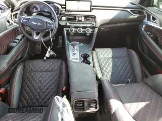 2023 Genesis G70 3.3T with VIN KMTG54TEXPU105082, listed as a Copart auction lot 65000724 with 12,941 mi miles and Salvage Title. Bid and sale history available at carsss.com. Image 8.