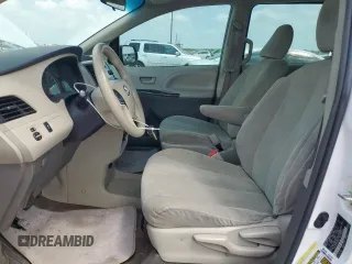 2014 Toyota Sienna L with VIN 5TDZK3DC9ES504168, listed as a Copart auction lot 53580095 with 253,688 mi miles and Salvage Title. Bid and sale history available at carsss.com. Image 7.