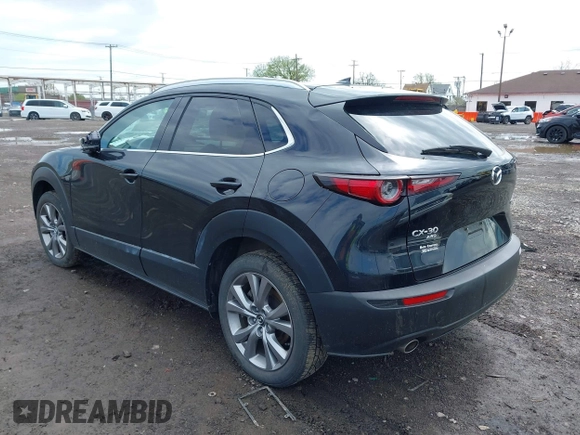 2022 Mazda CX-30 S Premium with VIN 3MVDMBDL5NM413878, listed as a IAAI auction lot 42189008 with 46,249 mi miles and . Bid and sale history available at DreamBid. Image 3.