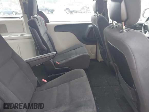 2014 Dodge Grand Caravan American Value with VIN 2C4RDGBG0ER452719, listed as a IAAI auction lot 41547145 with 151,636 mi miles and . Bid and sale history available at DreamBid. Image 8.