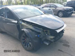 2023 Tesla Model Y Performance z VIN 7SAYGDEFXPF767971, wystawiony jako IAAI lot #42198881 z przebiegiem 32 442 mil mil oraz . Historia ofert i sprzedaży dostępna na DreamBid. Obrazek 19.
