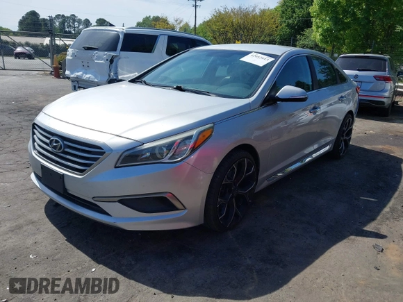 2015 Hyundai Sonata Sport with VIN 5NPE34AF6FH256579, listed as a IAAI auction lot 42052813 with 103,988 mi miles and . Bid and sale history available at DreamBid. Image 17.