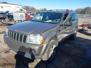 2006 Jeep Grand Cherokee Laredo with VIN 1J4GS48KX6C193586, listed as a IAAI auction lot 41260951 with 215,429 mi miles. Bid and sale history available at carsss.com. Image 2.