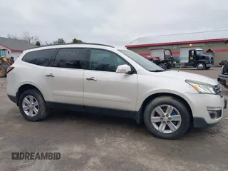 2013 Chevrolet Traverse LT with VIN 1GNKVGKD6DJ157719, listed as a IAAI auction lot 41987527 with 148,486 mi miles and . Bid and sale history available at DreamBid. Image 14.