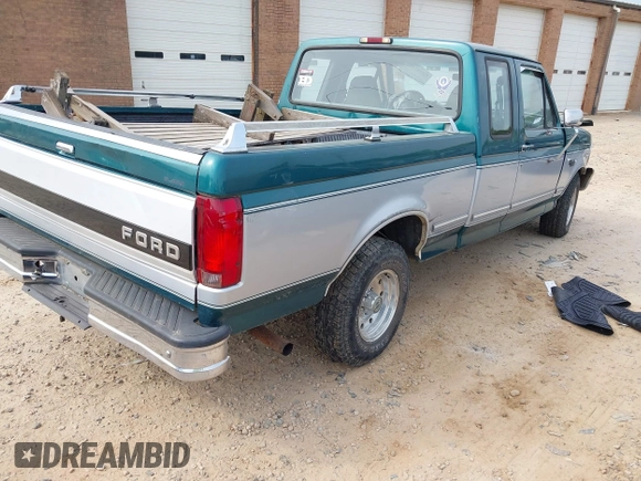 1996 Ford F-150 with VIN 1FTEX15N1TKA11657, listed as a IAAI auction lot 42076737 with 114,816 mi miles and . Bid and sale history available at DreamBid. Image 4.