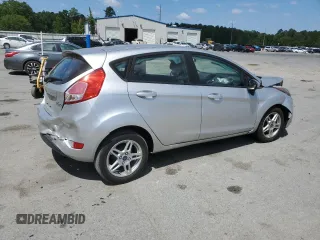 2019 Ford Fiesta SE z VIN 3FADP4EJ2KM142992, wystawiony jako Copart lot #55204795 z przebiegiem 98 018 mil mil oraz Szkody całkowita. Historia ofert i sprzedaży dostępna na DreamBid. Obrazek 3.
