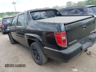 2011 Honda Ridgeline RT z VIN 5FPYK1F22BB451857, wystawiony jako IAAI lot #42253277 z przebiegiem 109 720 mil mil oraz . Historia ofert i sprzedaży dostępna na DreamBid. Obrazek 3.