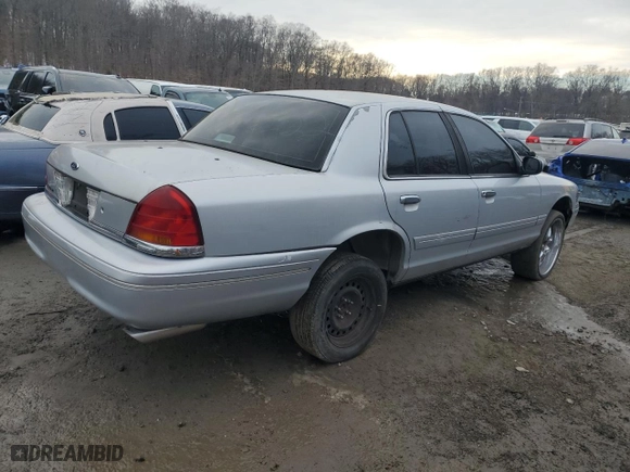 2002 Ford Crown Victoria Police Pkg Police Interceptor with VIN 2FAFP71W52X157860, listed as a Copart auction lot 42335115 with 175,053 mi miles and Salvage Title. Bid and sale history available at carsss.com. Image 3.