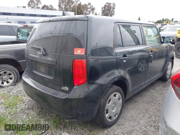 2009 Scion xB with VIN JTLKE50E291093909, listed as a IAAI auction lot 41870259 with 247,549 mi miles. Bid and sale history available at carsss.com. Image 4.