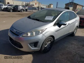 2012 Ford Fiesta S with VIN 3FADP4AJ5CM194589, listed as a IAAI auction lot 41984330 with 135,103 mi miles and . Bid and sale history available at DreamBid. Image 2.