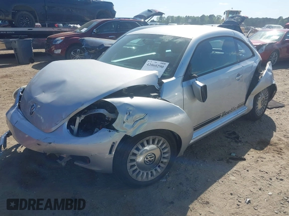 2014 Volkswagen Beetle 2.5L w/Sun with VIN 3VWJP7AT7EM633386, listed as a IAAI auction lot 42060290 with 273,374 mi miles and . Bid and sale history available at DreamBid. Image 18.
