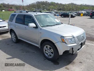 2008 Mercury Mariner Premier z VIN 4M2CU97198KJ12620, wystawiony jako IAAI lot #41909389 z przebiegiem 131 884 mil mil oraz . Historia ofert i sprzedaży dostępna na DreamBid. Obrazek 1.