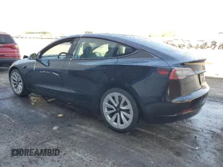 2022 Tesla Model 3 z VIN 5YJ3E1EA2NF372373, wystawiony jako Copart lot #59139335 z przebiegiem 79 106 mil mil oraz Czysty tytuł • Clean title. Historia ofert i sprzedaży dostępna na DreamBid. Obrazek 2.