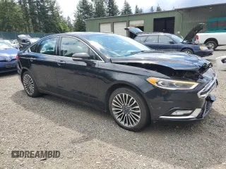 2017 Ford Fusion SE z VIN 3FA6P0H96HR150012, wystawiony jako Copart lot #56789925 z przebiegiem 167 772 mil mil oraz Szkoda całkowita • Salvage title. Historia ofert i sprzedaży dostępna na DreamBid. Obrazek 4.