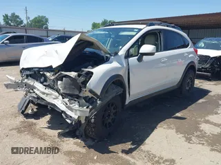 2013 Subaru Crosstrek Premium with VIN JF2GPACC5D2217013, listed as a IAAI auction lot 42261633 with 214,885 mi miles and . Bid and sale history available at DreamBid. Image 2.