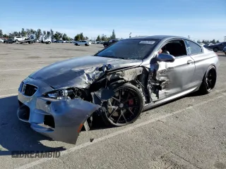 2015 BMW M6 with VIN WBSLX9C55FD160650, listed as a Copart auction lot 85047974 with Not provided miles and Salvage title. Bid and sale history available at DreamBid. Image 1.