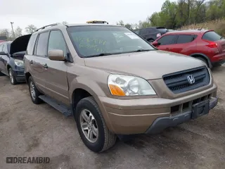 2003 Honda Pilot EX with VIN 2HKYF18463H621927, listed as a IAAI auction lot 42016994 with 180,001 mi miles. Bid and sale history available at carsss.com. Image 1.