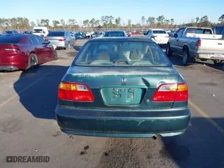 1999 Honda Civic VP with VIN 2HGEJ6614XH564053, listed as a IAAI auction lot 41317610 with 241,757 mi miles. Bid and sale history available at carsss.com. Image 17.