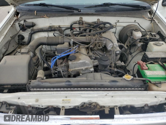 1997 Toyota T100 with VIN JT4JM11D9V0019752, listed as a Copart auction lot 82449524 with 279,981 mi miles and Salvage Title. Bid and sale history available at DreamBid. Image 11.