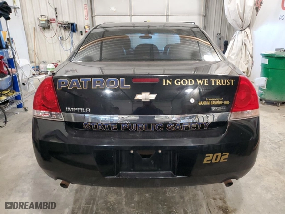 2011 Chevrolet Impala Police Police with VIN 2G1WD5EMXB1137065, listed as a Copart auction lot 82906884 with 0 mi miles and Salvage Title. Bid and sale history available at carsss.com. Image 6.