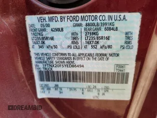 2000 Ford F-250 XL with VIN 1FTNX20F5YED86494, listed as a Copart auction lot 54193495 with 551,488 mi miles and Salvage title. Bid and sale history available at DreamBid. Image 12.