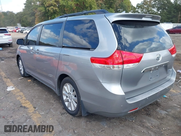 2011 Toyota Sienna XLE AAS with VIN 5TDYK3DC8BS157794, listed as a IAAI auction lot 40759823 with 211,716 mi miles and . Bid and sale history available at DreamBid. Image 3.