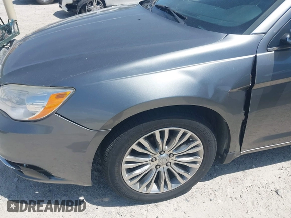 2012 Chrysler 200 Limited with VIN 1C3CCBCB1CN308772, listed as a IAAI auction lot 42187662 with 243,483 mi miles and . Bid and sale history available at DreamBid. Image 6.