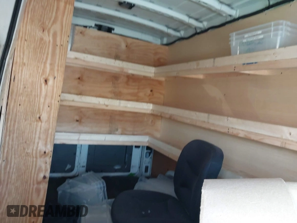 2016 Nissan NV Cargo SV z VIN 1N6BF0LY0GN805855, wystawiony jako IAAI lot #41849743 z przebiegiem Nie podano mil oraz . Historia ofert i sprzedaży dostępna na DreamBid. Obrazek 8.