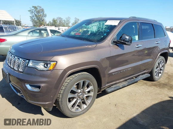 2017 Jeep Grand Cherokee Overland z VIN 1C4RJECG0HC960178, wystawiony jako IAAI lot #42315844 z przebiegiem 63 271 mil mil oraz . Historia ofert i sprzedaży dostępna na DreamBid. Obrazek 2.