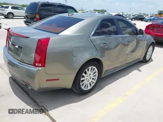 2010 Cadillac CTS Luxury with VIN 1G6DG5EG6A0148433, listed as a IAAI auction lot 42686517 with 106,701 mi miles and . Bid and sale history available at DreamBid. Image 4.
