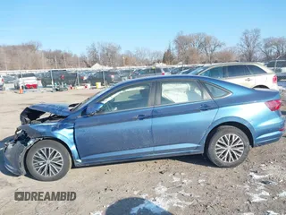 2021 Volkswagen Jetta S z VIN 3VWC57BU0MM054745, wystawiony jako IAAI lot #39772920 z przebiegiem 31 453 mil mil oraz . Historia ofert i sprzedaży dostępna na DreamBid. Obrazek 14.