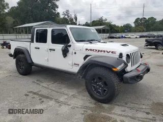 2023 Jeep Gladiator Mojave z VIN 1C6JJTEGXPL554672, wystawiony jako Copart lot #71845334 z przebiegiem 15 871 mil mil oraz Szkoda całkowita • Salvage title. Historia ofert i sprzedaży dostępna na DreamBid. Obrazek 4.