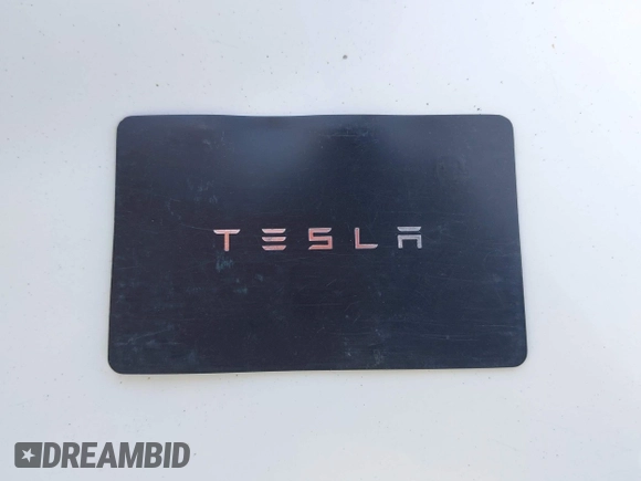 2021 Tesla Model Y Long Range with VIN 5YJYGDEE5MF191142, listed as a IAAI auction lot 41448514 with 71,626 mi miles. Bid and sale history available at carsss.com. Image 11.