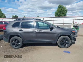 2018 Jeep Cherokee Latitude with VIN 1C4PJMCX3JD512650, listed as a IAAI auction lot 42609914 with 128,791 mi miles and . Bid and sale history available at DreamBid. Image 14.