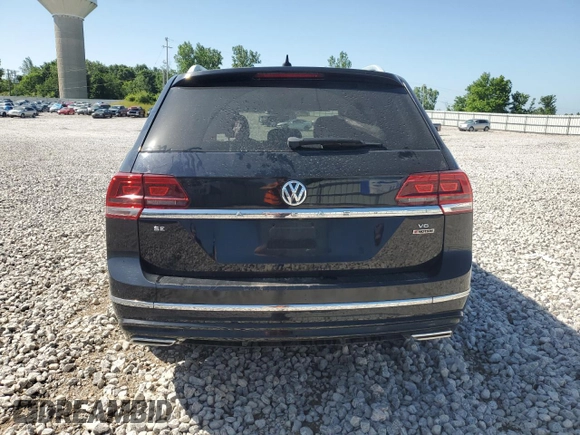 2018 Volkswagen Atlas SE z VIN 1V2PR2CAXJC534254, wystawiony jako Copart lot #61452935 z przebiegiem 105 956 mil mil oraz Czysty tytuł • Clean title. Historia ofert i sprzedaży dostępna na DreamBid. Obrazek 6.