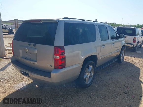 2007 Chevrolet Suburban LTZ with VIN 3GNFC16007G143249, listed as a IAAI auction lot 42097911 with 212,899 mi miles. Bid and sale history available at carsss.com. Image 4.