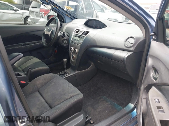 2012 Toyota Yaris with VIN JTDBT4K34CL030720, listed as a IAAI auction lot 42222397 with 252,669 mi miles and . Bid and sale history available at DreamBid. Image 5.